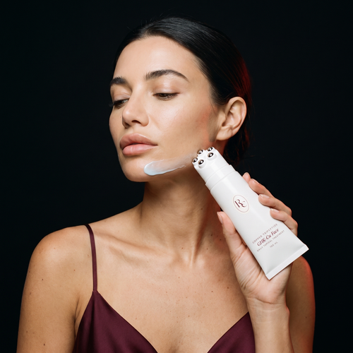 GHK-Cu Face roller applicator being used along the jawline
